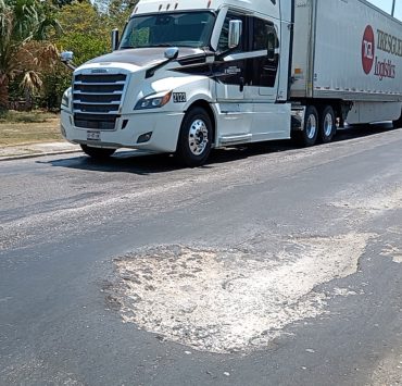 Ciudadanos pueden denunciar daños a sus vehículos causados por baches