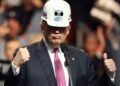 Donald Trump is vowing to save the coal industry. He donned a miner's hat during a recent West Virginia rally.